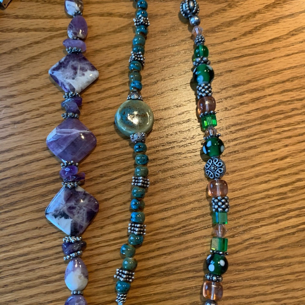 Three bracelets.